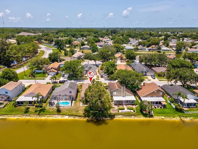 4716 Wolfram Ln, New Port Richey, FL 34653 - aerial perspective of suburban area featuring a nearby body of water