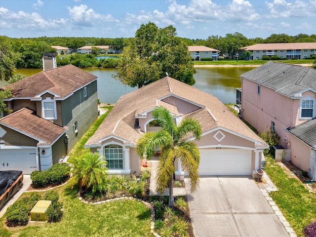4716 Wolfram Ln, New Port Richey, FL 34653 - aerial view of residential area with a large body of water