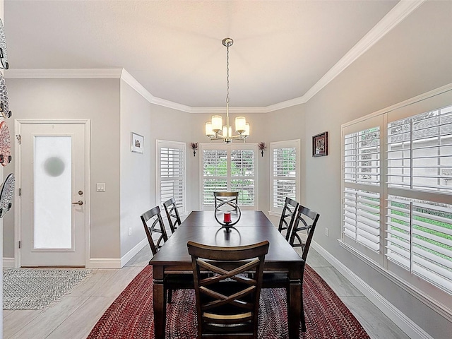 4082 Watson Dr, New Port Richey, FL 34655 - dining space featuring a chandelier and ornamental molding