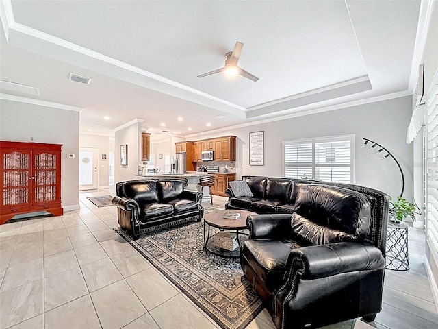 4082 Watson Dr, New Port Richey, FL 34655 - living area with a raised ceiling, a ceiling fan, crown molding, and recessed lighting