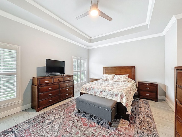 4082 Watson Dr, New Port Richey, FL 34655 - bedroom featuring a tray ceiling, ornamental molding, and ceiling fan