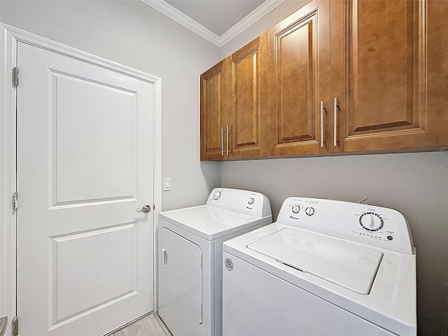 4082 Watson Dr, New Port Richey, FL 34655 - washroom with separate washer and dryer, cabinet space, and crown molding