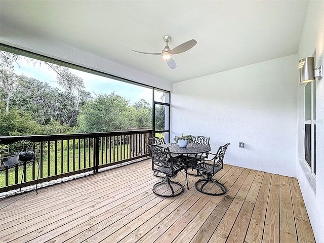 4082 Watson Dr, New Port Richey, FL 34655 - deck featuring a ceiling fan and outdoor dining area