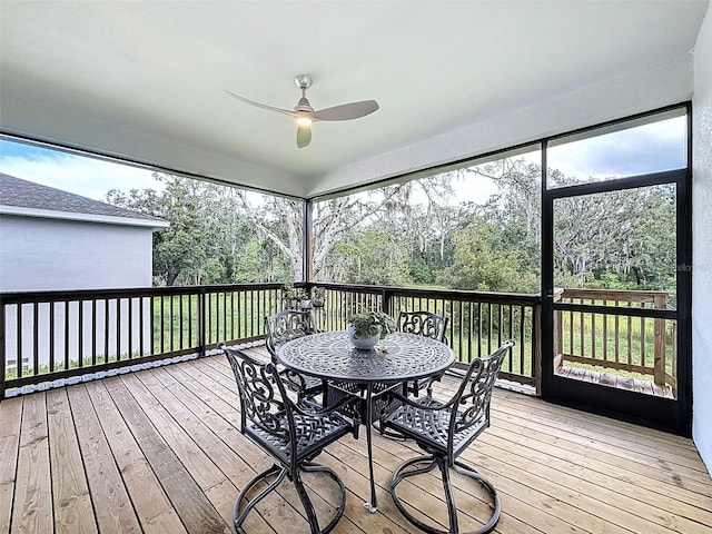 4082 Watson Dr, New Port Richey, FL 34655 - deck with outdoor dining space and a ceiling fan