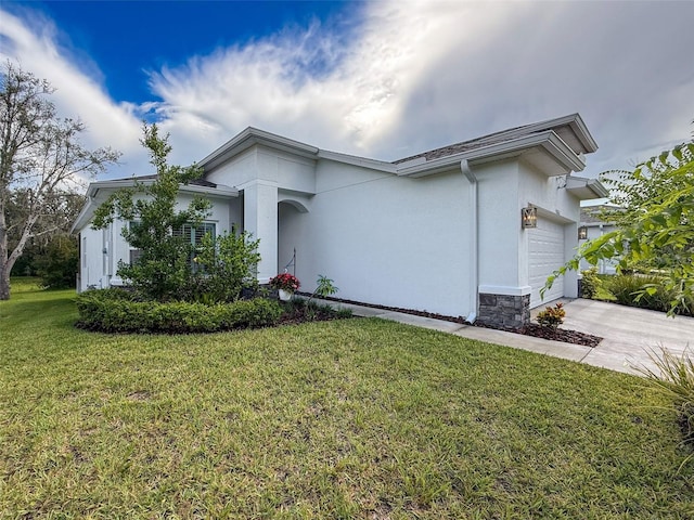 4082 Watson Dr, New Port Richey, FL 34655 - view of front of property with stucco siding, a front lawn, an attached garage, concrete driveway, and stone siding
