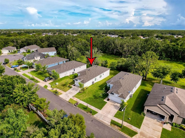 4082 Watson Dr, New Port Richey, FL 34655 - aerial perspective of suburban area with a heavily wooded area