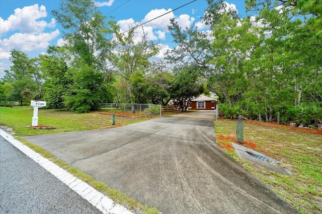 9130 Madrid Rd, Weeki Wachee, FL 34613 - view of front of home featuring driveway