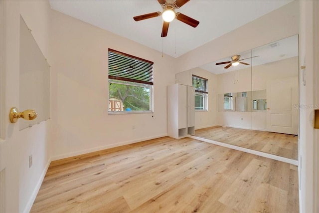 9130 Madrid Rd, Weeki Wachee, FL 34613 - unfurnished room with ceiling fan and wood finished floors