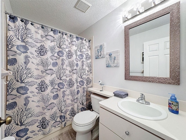 7518 Mediterranean Ct, Hudson, FL 34667 - full bathroom featuring a textured ceiling, vanity, and a shower with curtain