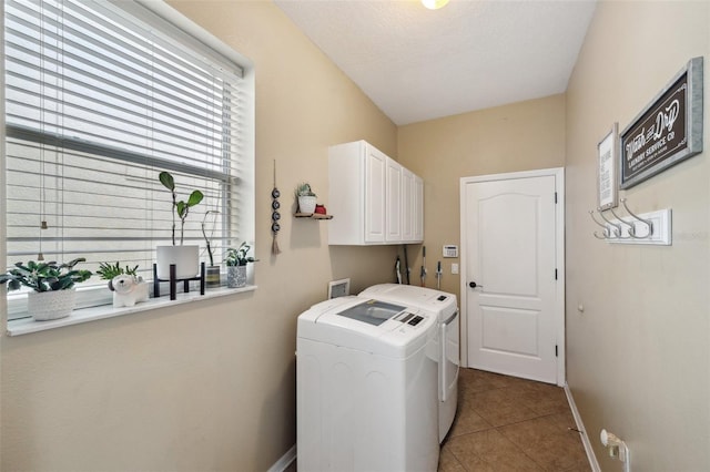 1410 Halapa Way, Trinity, FL 34655 - laundry area with separate washer and dryer, cabinet space, plenty of natural light, and tile patterned flooring
