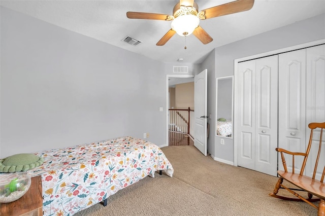 1410 Halapa Way, Trinity, FL 34655 - bedroom featuring light carpet, ceiling fan, and a closet