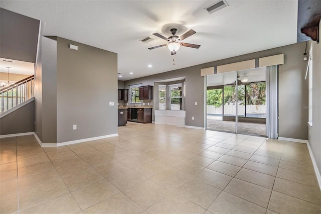 1104 Ketzal Dr, Trinity, FL 34655 - unfurnished living room featuring light tile patterned flooring, a ceiling fan, and recessed lighting