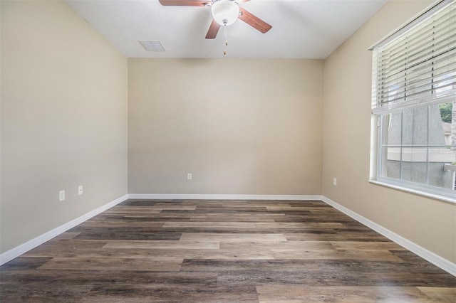 1104 Ketzal Dr, Trinity, FL 34655 - empty room with ceiling fan and wood finished floors