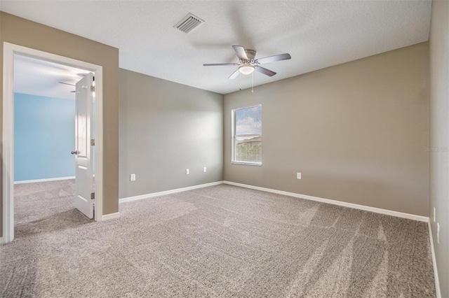 1104 Ketzal Dr, Trinity, FL 34655 - unfurnished room with carpet floors and a ceiling fan