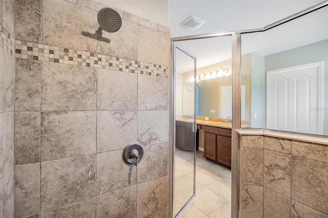1104 Ketzal Dr, Trinity, FL 34655 - full bathroom with tiled shower, vanity, and tile patterned floors