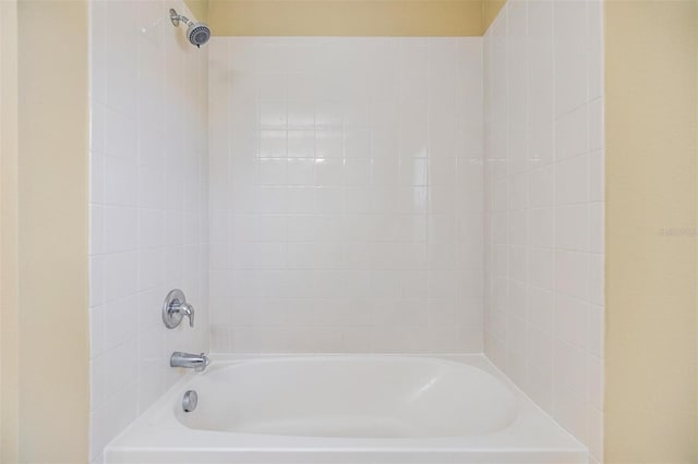 1104 Ketzal Dr, Trinity, FL 34655 - bathroom featuring washtub / shower combination