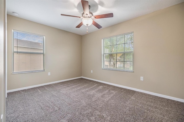 1104 Ketzal Dr, Trinity, FL 34655 - empty room with carpet, a ceiling fan, and a smoke detector