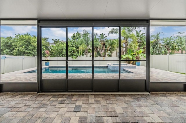 1104 Ketzal Dr, Trinity, FL 34655 - unfurnished sunroom featuring a hot tub