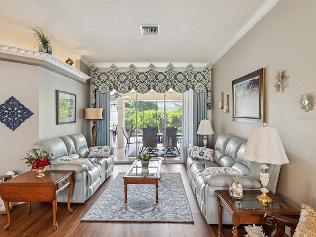 11144 Brambleleaf Way, Hudson, FL 34667 - living area with crown molding and wood finished floors