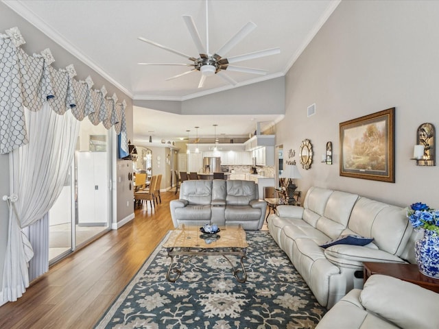 11144 Brambleleaf Way, Hudson, FL 34667 - living room with light wood-style flooring, ornamental molding, and a ceiling fan