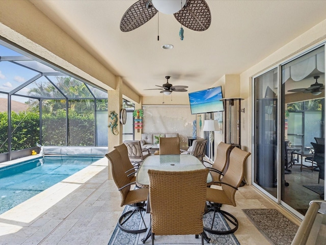 11144 Brambleleaf Way, Hudson, FL 34667 - view of patio / terrace featuring ceiling fan, a lanai, outdoor dining space, and an outdoor pool