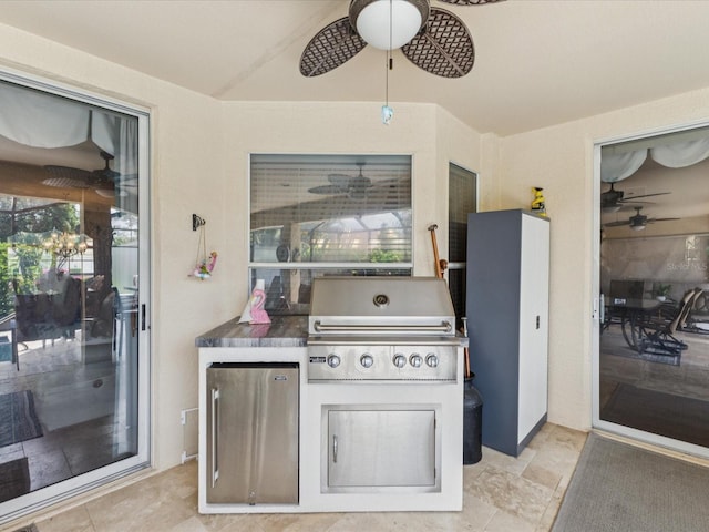 11144 Brambleleaf Way, Hudson, FL 34667 - view of patio / terrace with grilling area and a ceiling fan