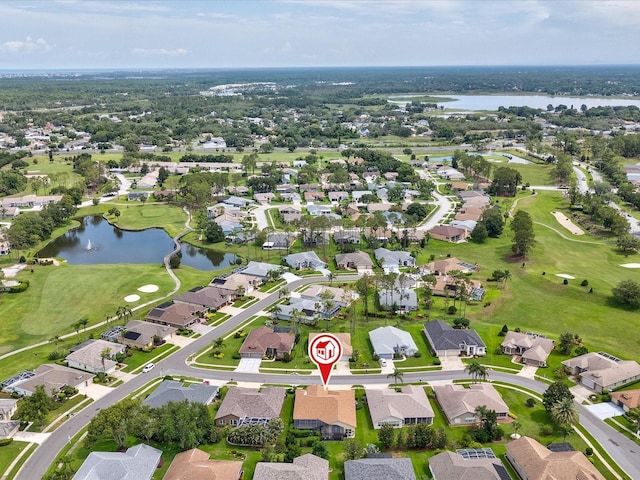 11144 Brambleleaf Way, Hudson, FL 34667 - aerial view of property and surrounding area featuring a nearby body of water, nearby suburban area, and a golf course
