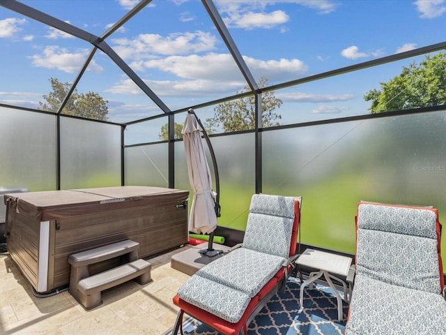 11144 Brambleleaf Way, Hudson, FL 34667 - view of patio / terrace with a hot tub and glass enclosure