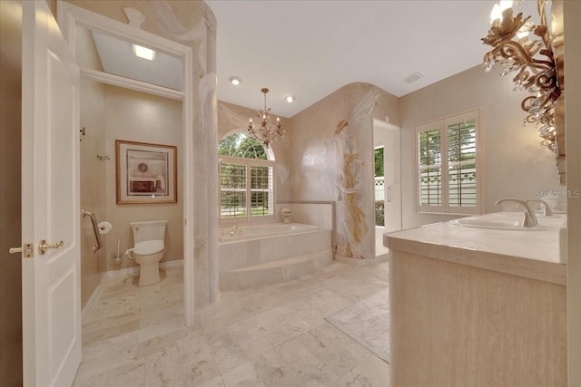 7275 Crystal Spring Run, Weeki Wachee, FL 34607 - bathroom with a garden tub, healthy amount of natural light, vanity, a chandelier, and recessed lighting