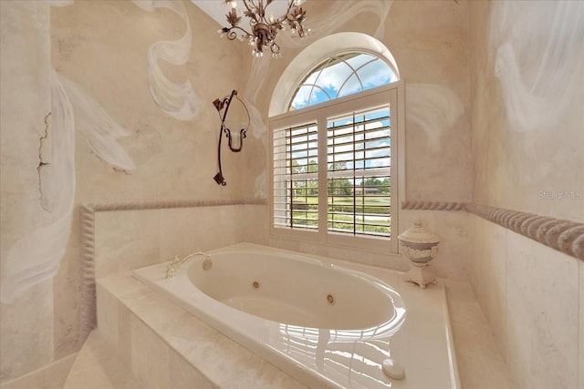7275 Crystal Spring Run, Weeki Wachee, FL 34607 - full bathroom with a tub with jets and a chandelier