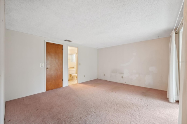 8340 Saint Marks Ct, Hudson, FL 34667 - carpeted spare room featuring a textured ceiling