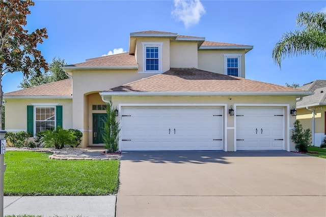 13772 Dunwoody Dr, Spring Hill, FL 34609 - view of front of house featuring stucco siding, a garage, concrete driveway, and a front lawn