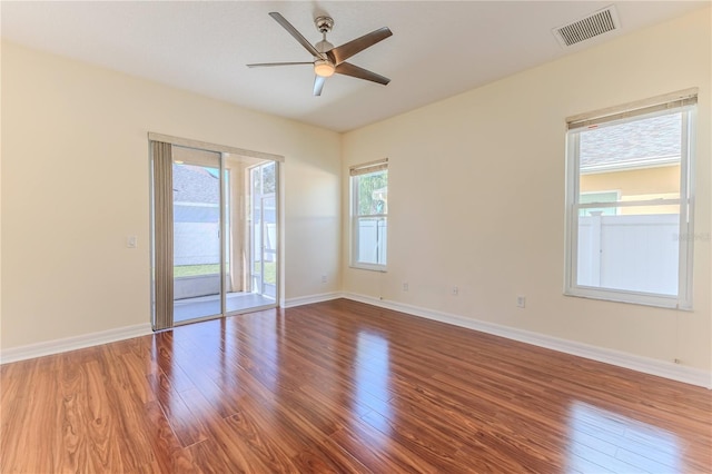 13772 Dunwoody Dr, Spring Hill, FL 34609 - empty room with wood finished floors and ceiling fan