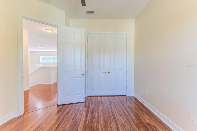 13772 Dunwoody Dr, Spring Hill, FL 34609 - unfurnished bedroom featuring a closet and wood finished floors