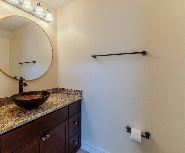 13772 Dunwoody Dr, Spring Hill, FL 34609 - bathroom with vanity and baseboards