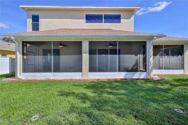 13772 Dunwoody Dr, Spring Hill, FL 34609 - back of property featuring a sunroom, a ceiling fan, a shingled roof, and stucco siding