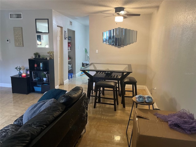 203 Pine Violet Ct Unit 202, Tampa, FL 33612 - living area featuring ceiling fan and baseboards