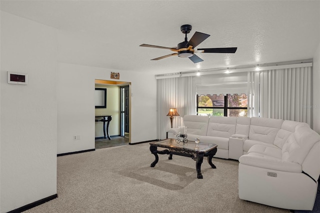 1376 Fayetteville Dr, Spring Hill, FL 34609 - carpeted living room featuring a ceiling fan and baseboards