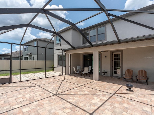 19326 Long Lake Ranch Blvd, Lutz, FL 33558 - view of patio / terrace featuring ceiling fan, glass enclosure, and outdoor dining space
