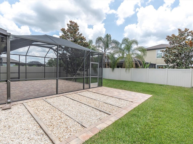 19326 Long Lake Ranch Blvd, Lutz, FL 33558 - fenced backyard featuring a patio area and glass enclosure