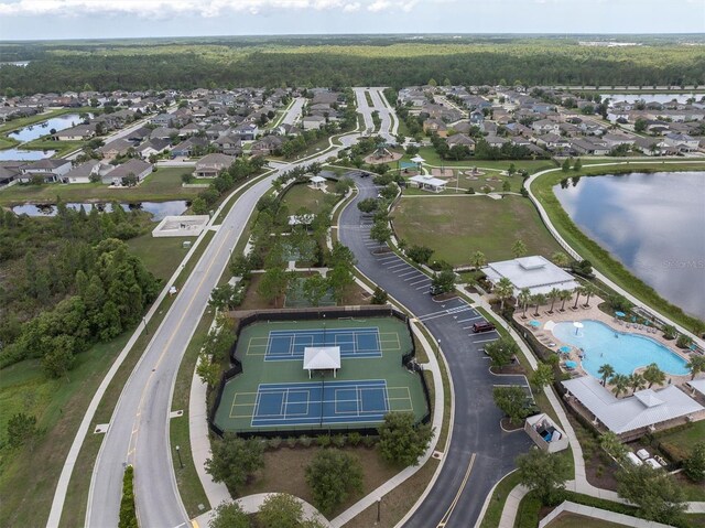 19326 Long Lake Ranch Blvd, Lutz, FL 33558 - aerial view of property and surrounding area featuring a nearby body of water and nearby suburban area