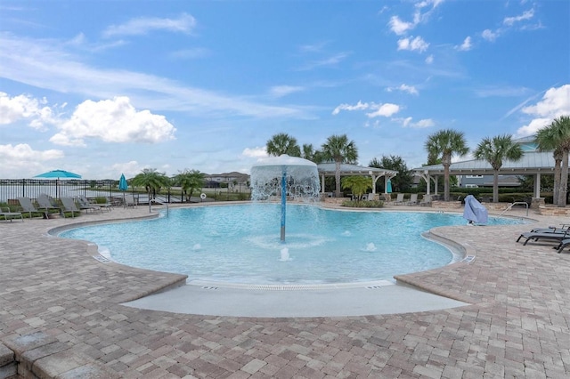 19326 Long Lake Ranch Blvd, Lutz, FL 33558 - community pool featuring a patio area