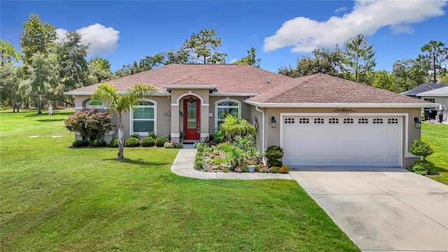 12323 House Finch, Weeki Wachee, FL 34614 - mediterranean / spanish-style house with stucco siding, a garage, driveway, a front lawn, and a shingled roof