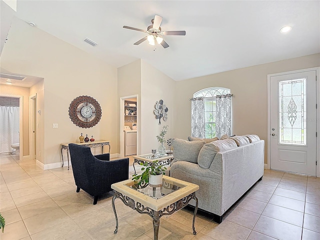 12323 House Finch, Weeki Wachee, FL 34614 - living area featuring light tile patterned flooring, ceiling fan, separate washer and dryer, recessed lighting, and high vaulted ceiling
