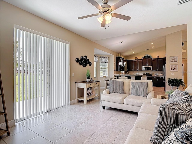 12323 House Finch, Weeki Wachee, FL 34614 - living area with light tile patterned floors, ceiling fan, vaulted ceiling, and recessed lighting