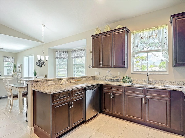 12323 House Finch, Weeki Wachee, FL 34614 - kitchen with dishwasher, light tile patterned flooring, a peninsula, healthy amount of natural light, and lofted ceiling