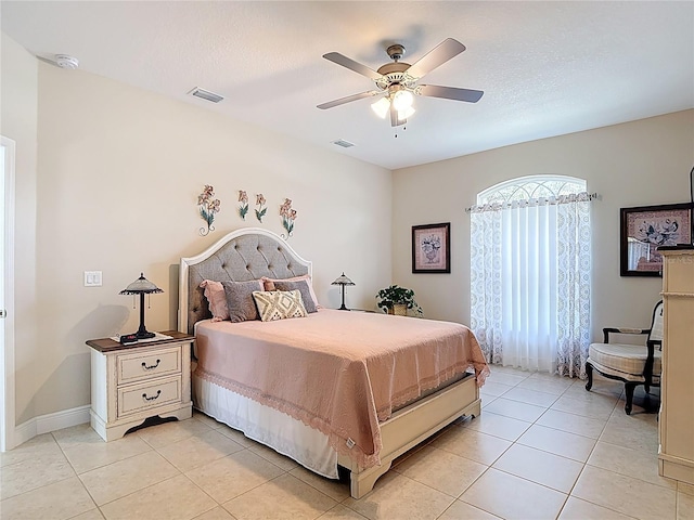 12323 House Finch, Weeki Wachee, FL 34614 - bedroom featuring light tile patterned floors and a ceiling fan