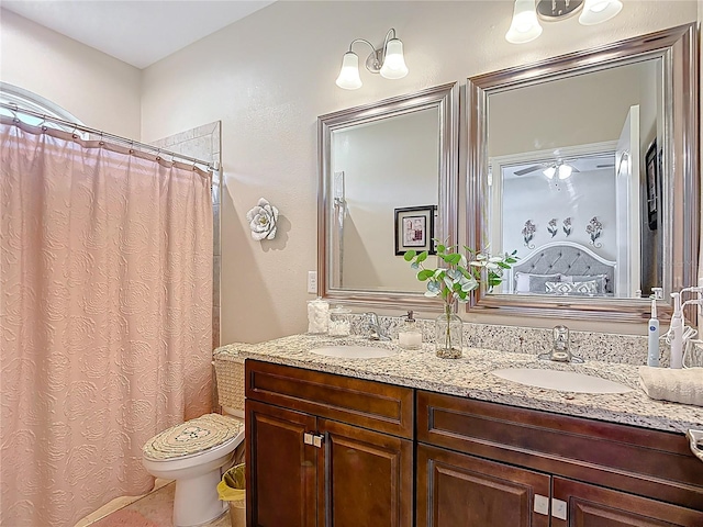 12323 House Finch, Weeki Wachee, FL 34614 - full bathroom featuring double vanity and a shower with shower curtain