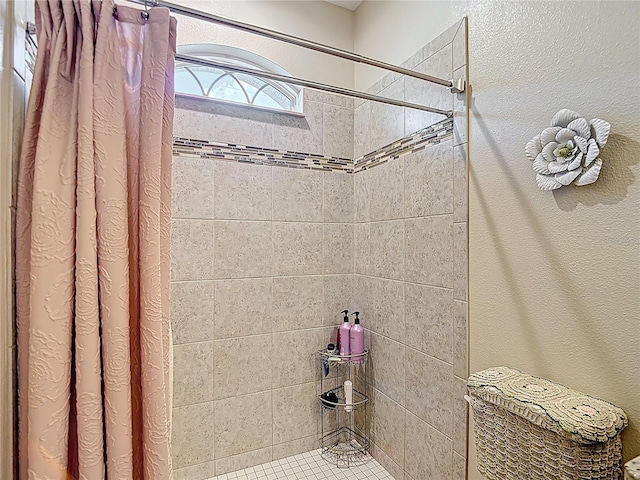 12323 House Finch, Weeki Wachee, FL 34614 - bathroom featuring tiled shower