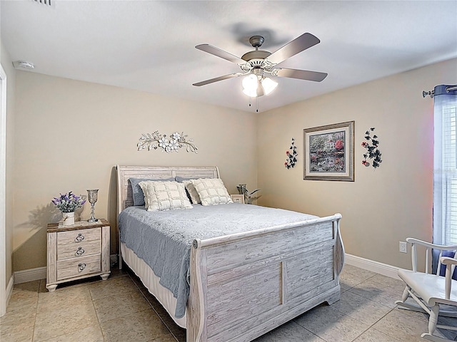 12323 House Finch, Weeki Wachee, FL 34614 - bedroom with light tile patterned floors and a ceiling fan
